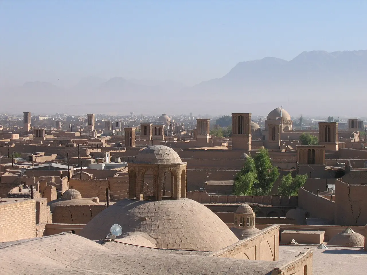 Early morning view of Yazd. many wind catchers and domes are visible — This is a photo of a monument in Iran identified by the ID