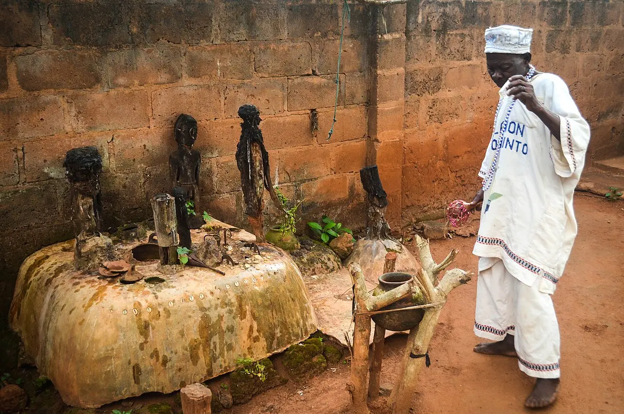 Vodoun d'Abomey — A priest in Abomey caring for a shrine Taken on 07 October 2013 in Benin around Abomey freewheely.com : Cycling Africa beyond mountains and deserts until Cape To…