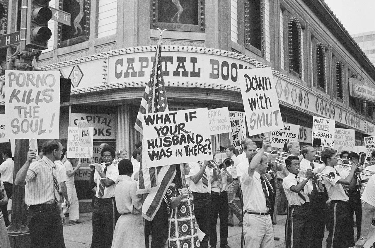 Members of the Unification Church picketing a pornographic bookstore in Washington, D.C., 1976 Members of the Unification Church picketing a pornographic book store, on 14th street, N.W., Washington, DC PORNO KILLS THE SOUL! — Members of the Unification Church picketing a pornographic bookstore in Washington, D.C., 1976 Members of the Unification Church picketing a pornographic b…