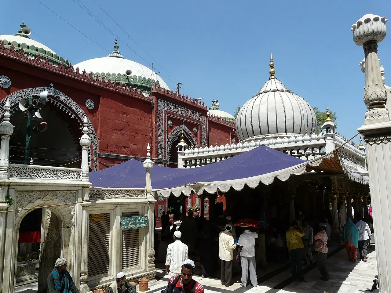 Mughal princess Jahan Ara's tomb (left), Nizamuddin Auliya's tomb (right) and Jama'at Khana Masjid (background), at Nizamuddin Dargah complex, in Nizamuddin West, Delhi Nizamuddin Dargah and Jamaat Khana Masjid, in Niza… Nizamuddin Dargah and Jamaat Khana Masjid, Delhi — Mughal princess Jahan Ara's tomb (left), Nizamuddin Auliya's tomb (right) and Jama'at Khana Masjid (background), at Nizamuddin D…