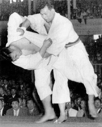Yoshimatsu vs. Daigo in 1951 — Yoshihiko Yoshimatsu attempting to throw Toshiro Daigo with an uchi mata in the final of the 1951 All-Japan Judo Championships Japanese judoka, Yosh…